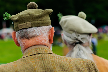 Two men watching Scottish Highland Games